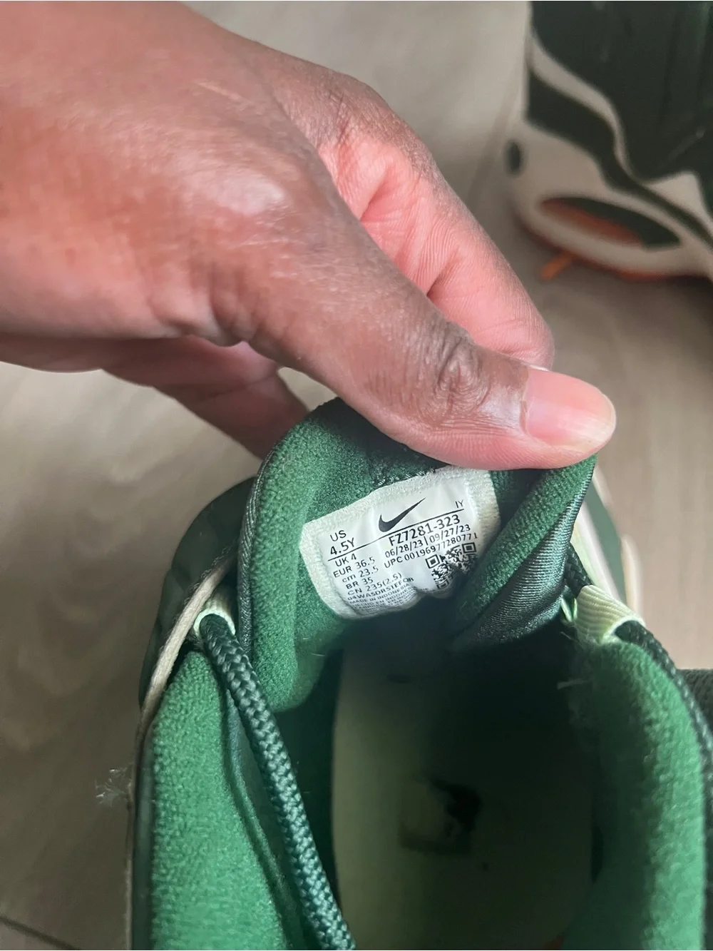 Nike Green Sneakers with Orange Accents